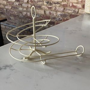 Cream metal egg skelter